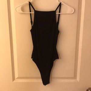Backless black ribbed bodysuit